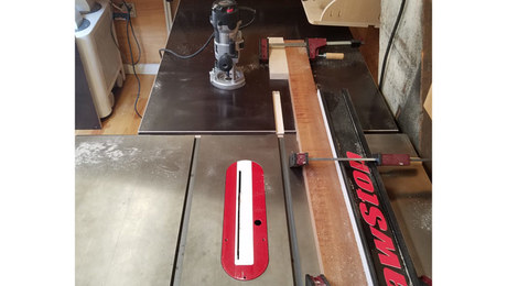 Bob Miller shares a simple way to do a simple task–accurately routing miter-slot extensions in an outfeed table.