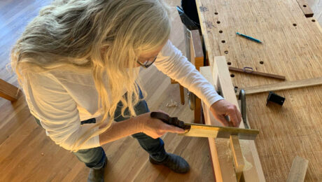 Megan Fitzpatrick saws by hand